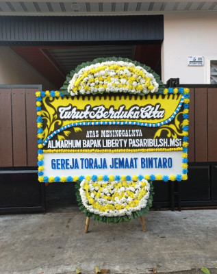 Papan Bunga Duka di Naioni